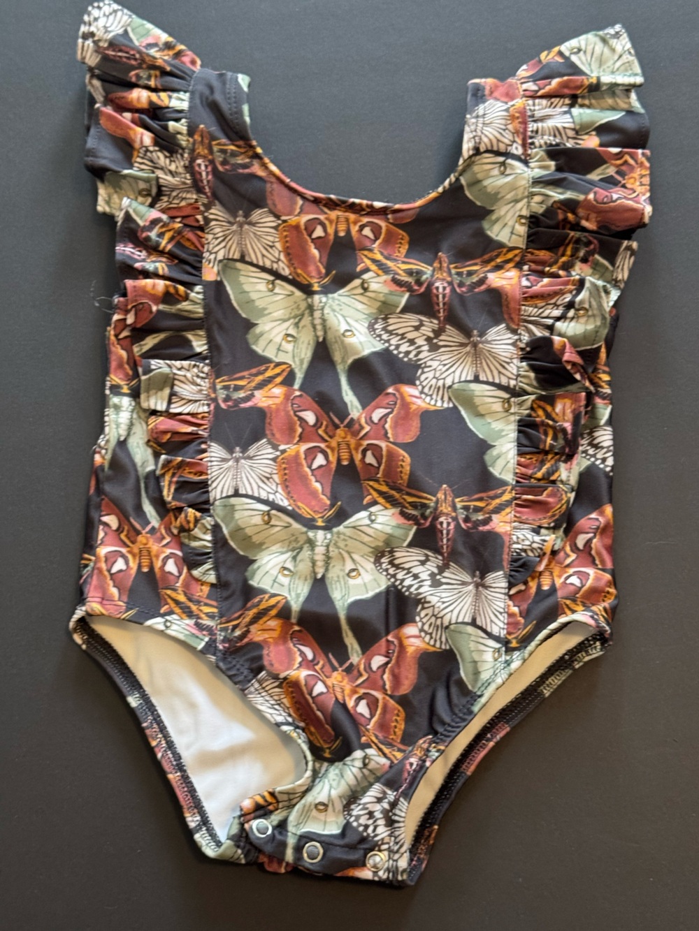 kate quinn Black One-Piece Swimsuit with Green and Rust Moth Print